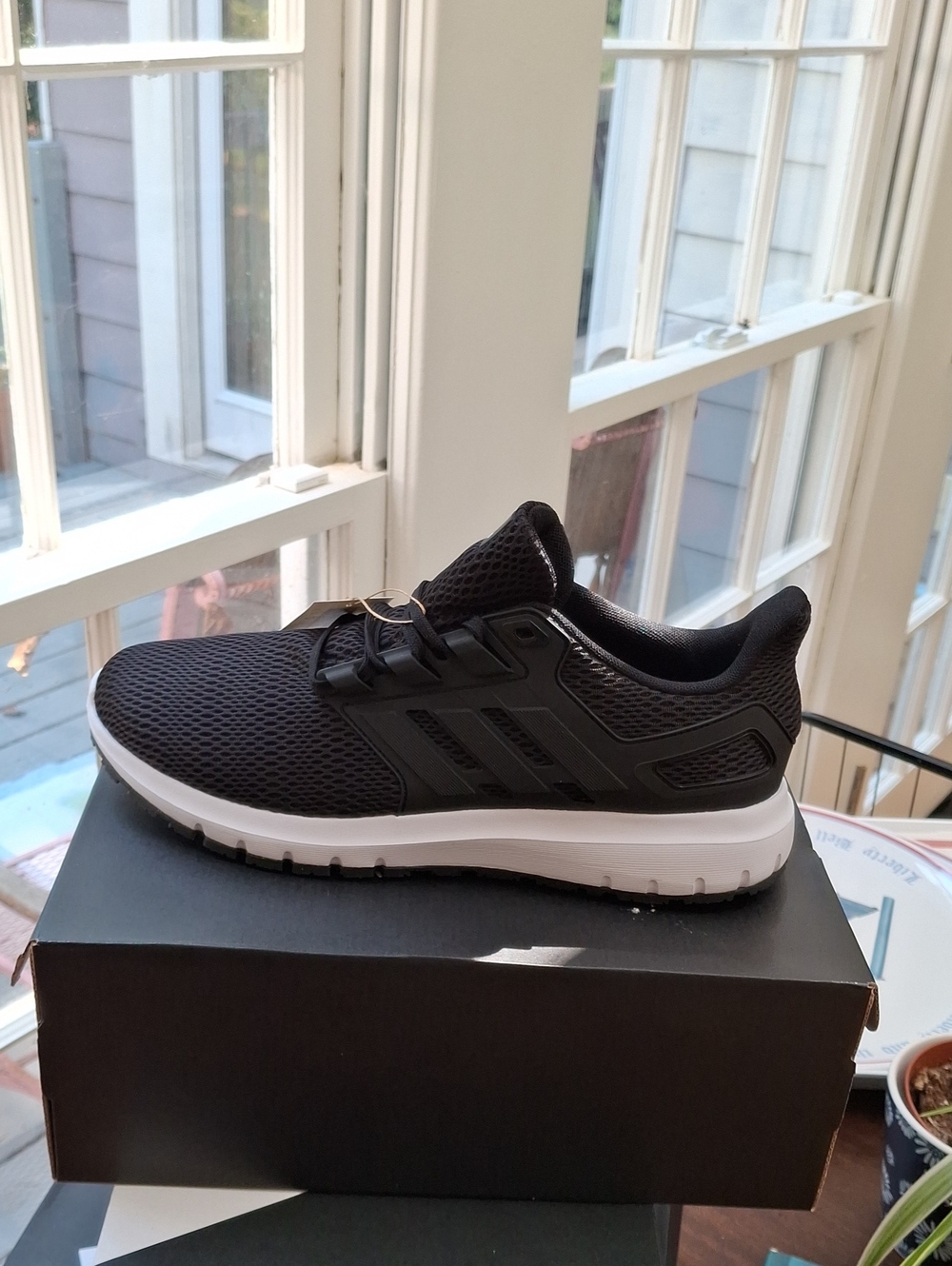 adidas Men's Black Athletic Running Shoe with White Midsole
